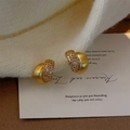 Pendientes de aro en oro mate con circonitas pavé y acabado de metal cepillado mujer - Oro Mate Curva Cruzada