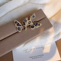 Goldene Schmetterlings-Ohrstecker mit blauen Kristallen und Zirkonia-Mikropavé - Blauer Zirkon Schmetterling (Gold)