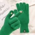 Neon green knitted gloves with fingerless design and branded label for winter warmth - One Size / Green