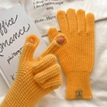 Yellow waffle knit touchscreen gloves with thumb and index finger openings for cold weather - One Size / Orange