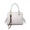 Minimalist beige leather tote bag with gold hardware and woven rope accessory detail - Gray
