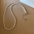 Detail of silver irregular bead necklace with heart pendant on textured brown leather - Irregular Silver Bead Chain (X364) / Silver Irregular Bead Chain