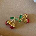 Close-up of cherry stud earrings with red lacquer fruit and green zircon leaves - Gold Base Cherry (E2938)