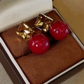Elegant red square crystal and pearl drop earrings displayed in a luxury jewelry box - Brown Cube with Red Artificial Pearls