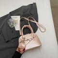 Peach pink shell handbag with glossy leather finish and heart charm for women - Pink (With Pendant)
