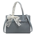Light blue textured fabric tote bag with lace bow detail and metallic twist lock - Blue