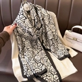 Elegant black and white silk scarf featuring large rose patterns and wide black borders - 90x180cm / Camellia Flower Beige