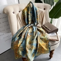 Elegant dark teal silk scarf with golden leaf print draped on a beige knit sweater - 90*180cm / Light Blue & Yellow