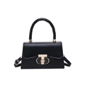 Classic black leather handbag with round top handle and gold T-bar buckle in white background - Black