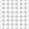 Close-up of laser silver star stickers with metallic finish for student rewards - White