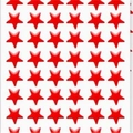 Close-up of red star stickers in an array pattern for reward charts and scrapbooking - Red