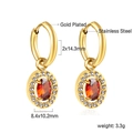 Close-up of gold plated stainless steel hoop earrings with oval ruby and diamond halo - Gold Red Stone Style (EA59910EG)