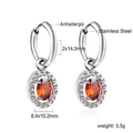 Detail view of stainless steel hoop earrings with oval red stone and crystal halo - Silver Red Stone Style (EA59910ES)