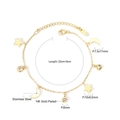 Detail of 14K gold plated stainless steel bracelet with star, moon and zircon charms - 14K Gold Star Moon Style (BR234201K)