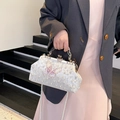 Elegant pearl shell bag with butterfly embroidery and vintage hollow metal handle - White
