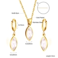 Detail view of gold-plated stainless steel jewelry set with white shell butterfly motifs - Gold Marquise Leaf (SE25570AG)