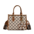 Brown monogram tote bag with top handles and adjustable floral charm strap in white background - Khaki Mosaic