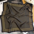 Detail of silk square scarf featuring gold horseshoe print on black satin fabric - 70x70cm / Black & Gold
