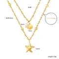Gold double-layered necklace featuring starfish shell pendants and white pearl detail - Shiny Gold (NE30870AG)