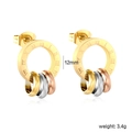 Macro detail of tricolor interlocking rings on a golden stud with Roman numeral engravings - Tricolor Roman Numeral Gold Style (EA5D790MG)