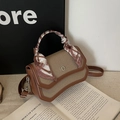 Retro woven crossbody bag with brown leather trim and decorative silk scarf handle - Brown