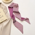 Elegant purple and white checkered skinny scarf twilly tied on a beige blazer jacket - Checkerboard Pattern