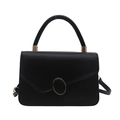 Minimalist black leather crossbody bag with oval gold-rimmed buckle and top handle - Black