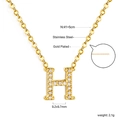 Detailed view of H-letter pendant necklace in gold-plated stainless steel with zircon stones - Gold Letter H