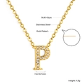 Macro detail of 18K gold plated stainless steel letter P pendant with inset zirconia - Gold Letter P