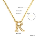 Macro detail of gold plated letter R pendant with white cubic zirconia and dimensions - Gold Letter R