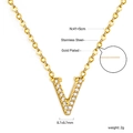 Detail view of 18K gold plated V letter pendant necklace with sparkling zircon pavé - Gold Letter V