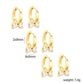 Tres pares de pendientes de aro dorados de mariposa con piedras de circonita de corazón - Aro de Lazo (ET11390AG) / Set de 3 pares / Dorado