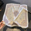 Close-up of lightweight paisley 100% silk neck scarf on a stylish grey background - 53*53cm / Pink