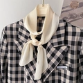 Detail view of cream pleated silk scarf with accordion folds styled on a blazer - Pleated Medium-Long Style (YZ-20-) / 130x10cm / Beige