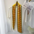 Detail of yellow pleated skinny scarf with green trim and letter R print on a knit top - 10*100cm / Ginger Yellow (YZ-15)