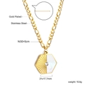 Macro view of geometric gold pendant featuring white shell inlay and zircon center - Gold Hexagon Style (NE2B260AG)