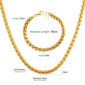 Detailed view of 7mm gold-plated stainless steel wheat chain necklace and bracelet set - 60CM / Gold