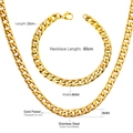 Vista macro del set collana e bracciale a maglia barbazzale in acciaio dorato da 8mm - Collana Colore Oro 60cm e Bracciale 22cm / Larghezza 8mm