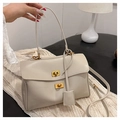 Detail of beige faux leather tote with twin gold rectangular twist locks and fine texture - Large / Light Gray