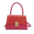 Pink faux leather handbag with golden crocodile texture and metallic turn-lock closure - Pink