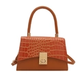 Brown crocodile pattern crossbody bag with golden metal twist lock and top handle - Brown