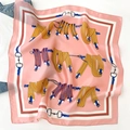 Pink silk square scarf with equestrian horsebit pattern on blue jeans and white tee - Horsebit Belt Pattern / Standard Square / Pink