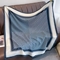 Detail of luxury square scarf featuring navy blue and beige monogram chain patterns - 90*90cm / Navy Blue