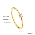 Macro detail of gold plated stainless steel ring featuring 3.3mm width and round zircon - White Zirconia Style (RI1311A6-9G)