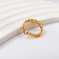 Vintage gold twisted chain ring with a sparkling round zircon stone for a minimalist look - US 7 / White Zirconia