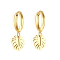 Golden stainless steel hoop earrings with monstera leaf pendants on white background - Gold Monstera Leaf Style (EA560001G)