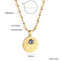 Détail du collier en acier inoxydable plaqué or avec pendentif œil bleu et gravure d'étoile - Style Étoiles Mauvais Oeil Or (NE2B360KG)
