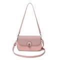 Minimalist pink crossbody bag for women with flap texture and silver ring buckle detail - Pink