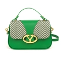 Green leather crossbody bag featuring a woven wave pattern flap and gold oval hardware - Green