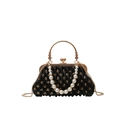 Pleated sequin shell bag with pearl handle and golden heart clasp in black - Black